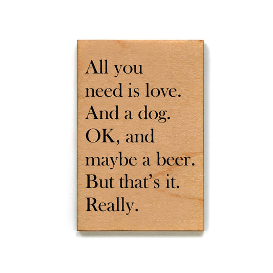 “All you need is love and a dog. OK, and maybe a beer." Funny Magnet